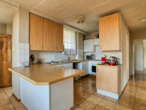 Earthy tone cabinets kitchen design trend